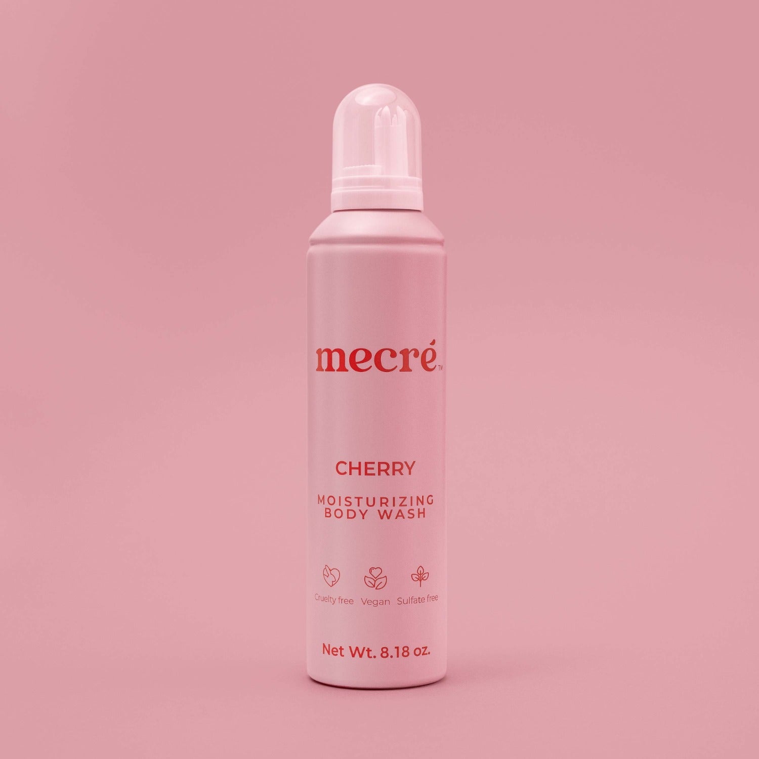 Front view of Mecré moisturizing body wash bottle in cherry scent, featuring a pink bottle.